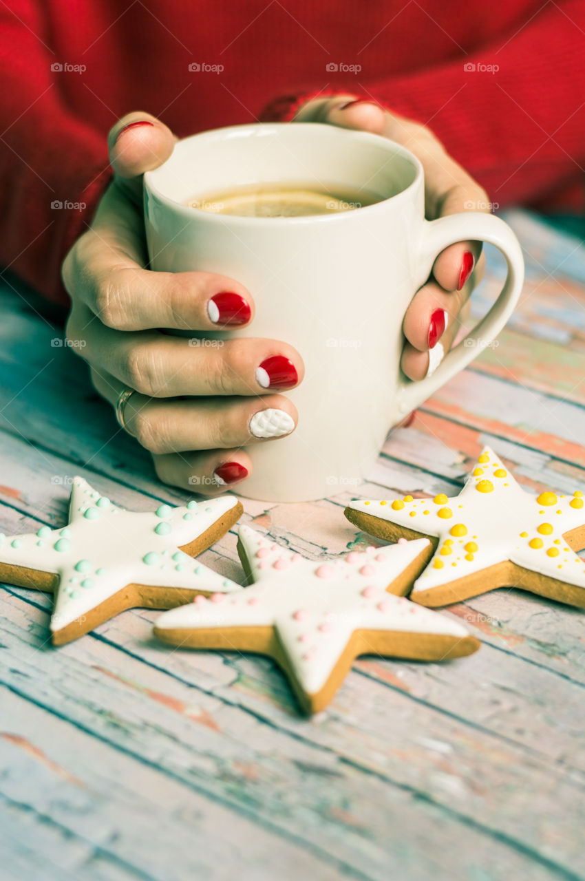 woman hand with cup of tea