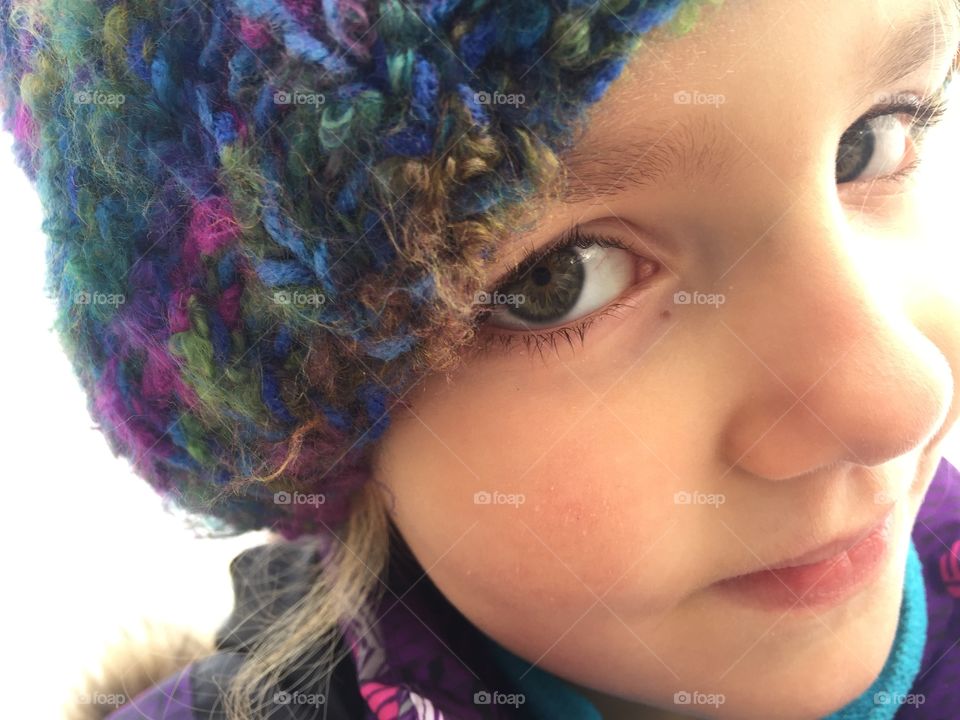 Close-up girl wearing knit hat