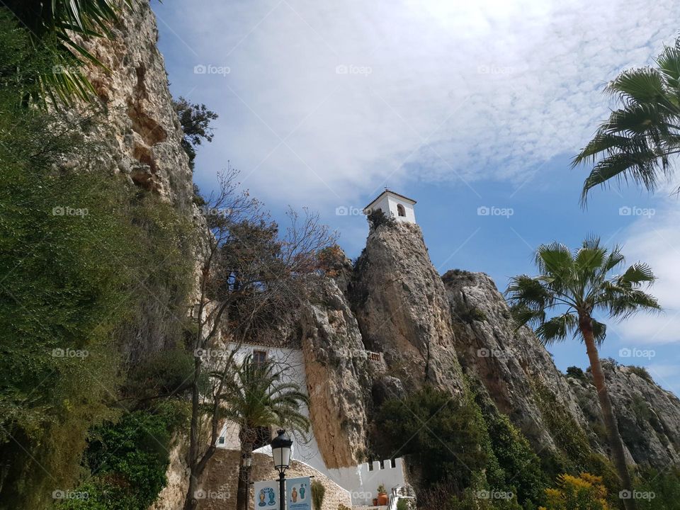 Mountains#rocks#palms#sky