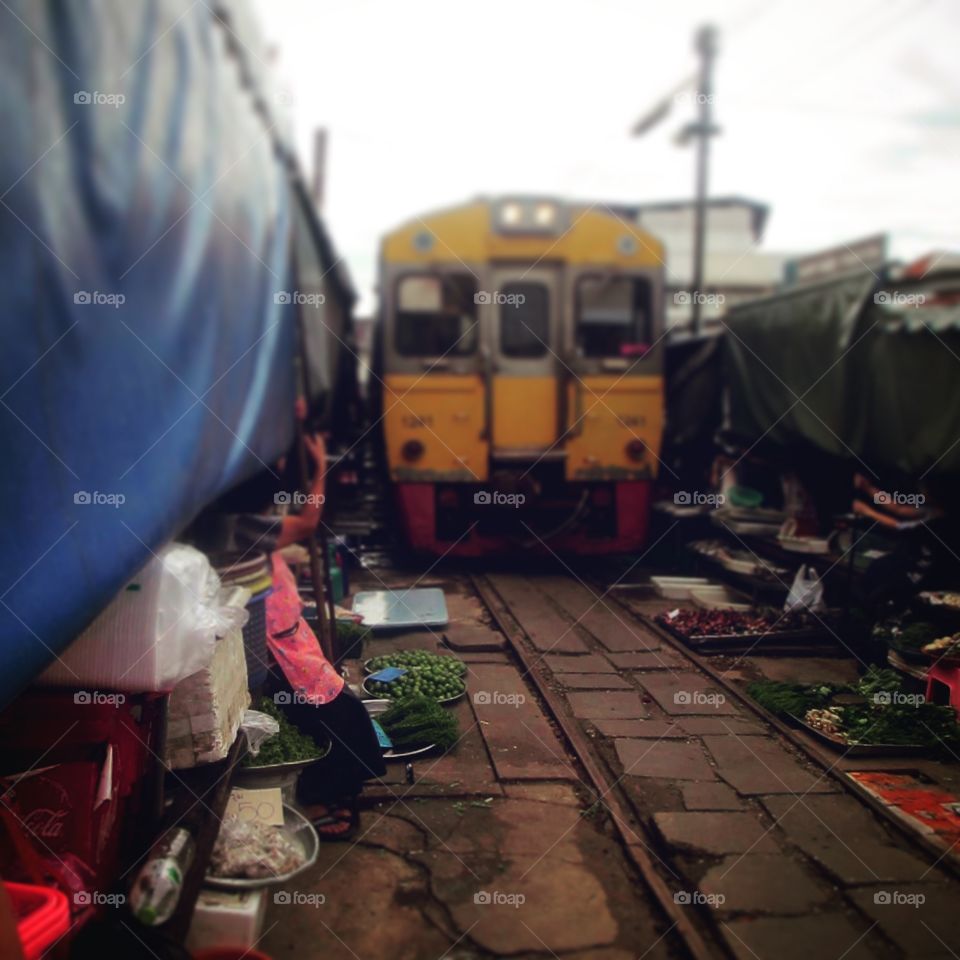The Train Market of Maeklong. It was strange and interesting watching as the market transformed in order to make way for the train 
