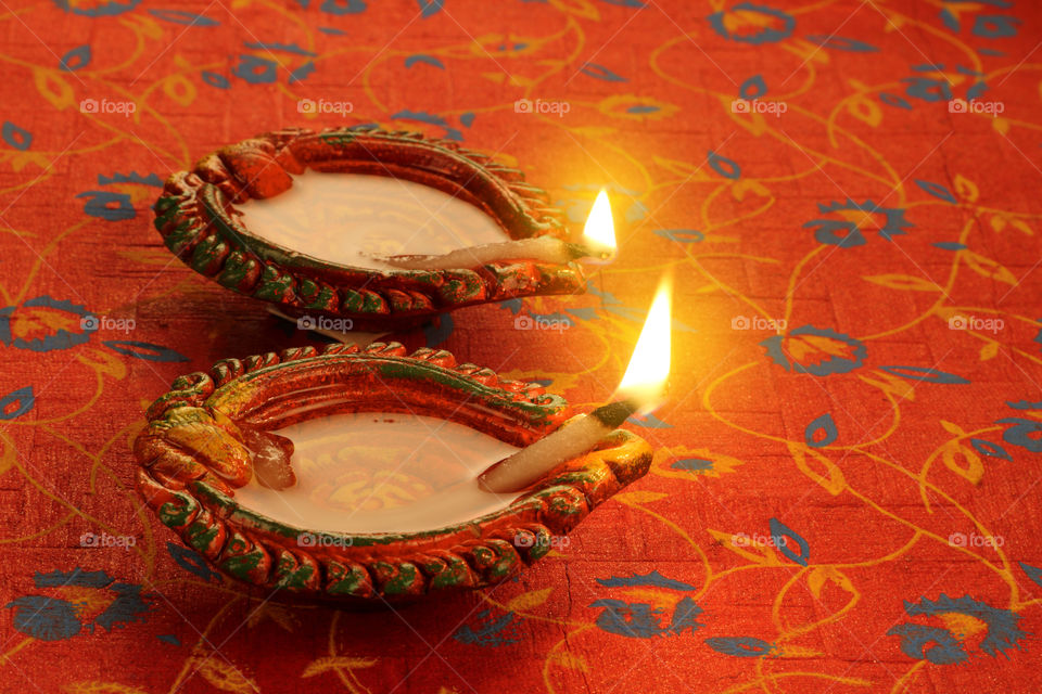 Two Diwali lamps - traditional Indian pottery oil lamps