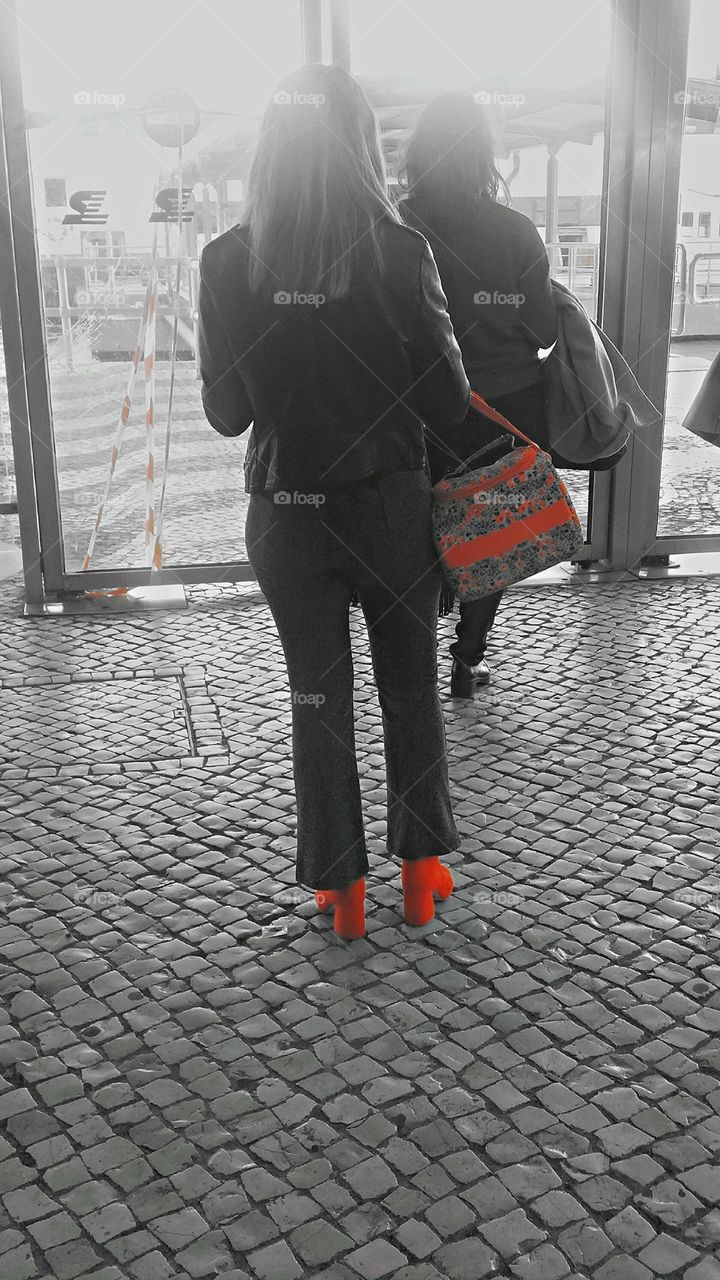 Girl in red boots.