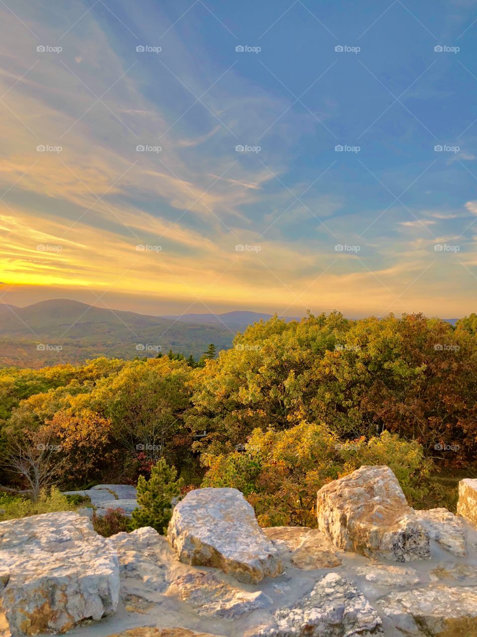 Scenic View of the skyline at sunset on top of Mount Battie in Camden, Maine during the Fall season