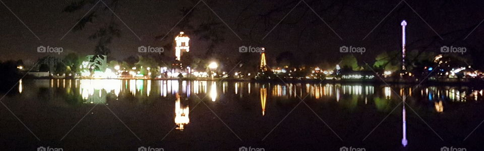 Lakeside At Night. Lakeside Amusement Park (Denver, CO) reflected in the lake late one night.