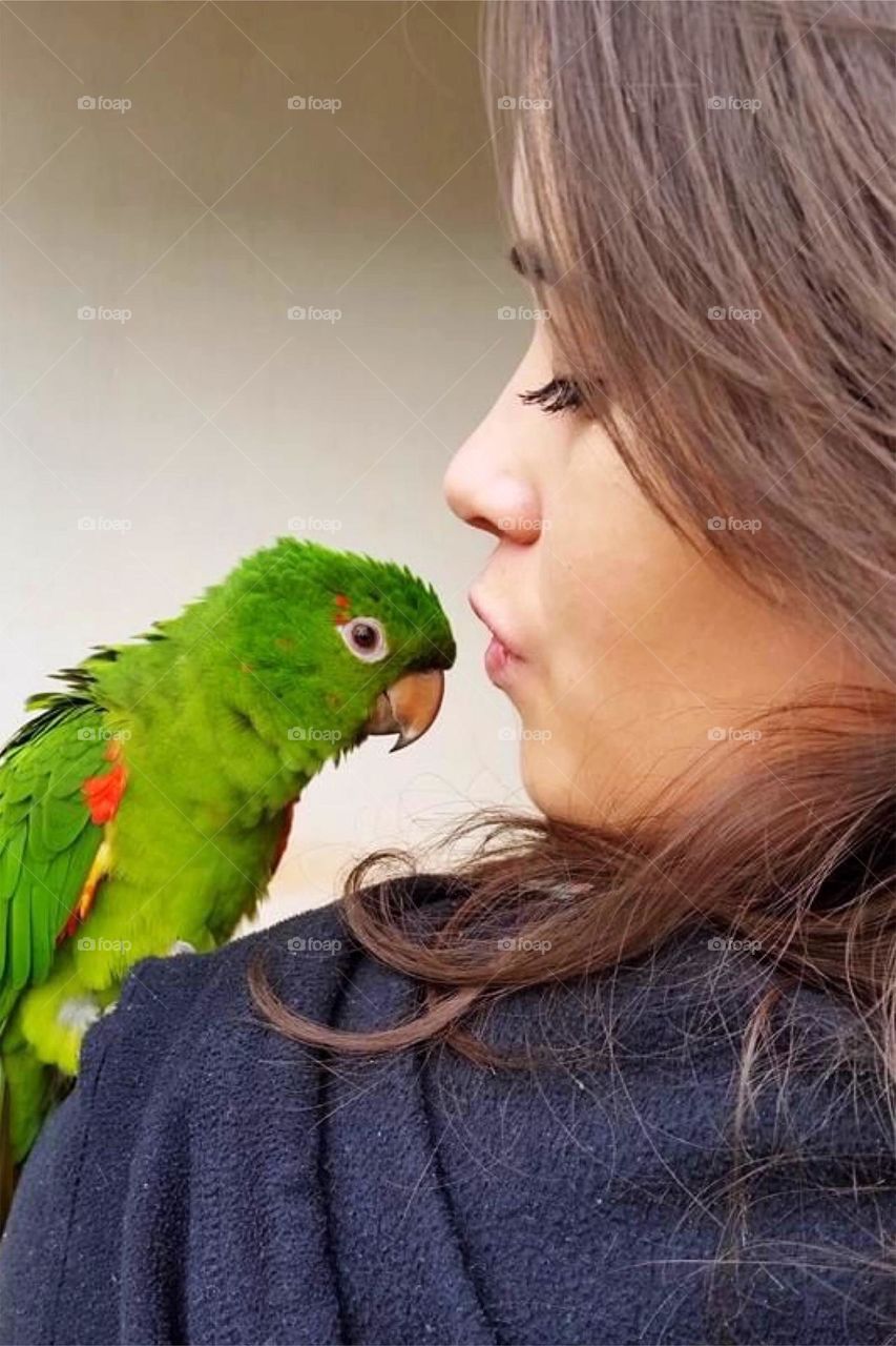 Girl with her pet bird