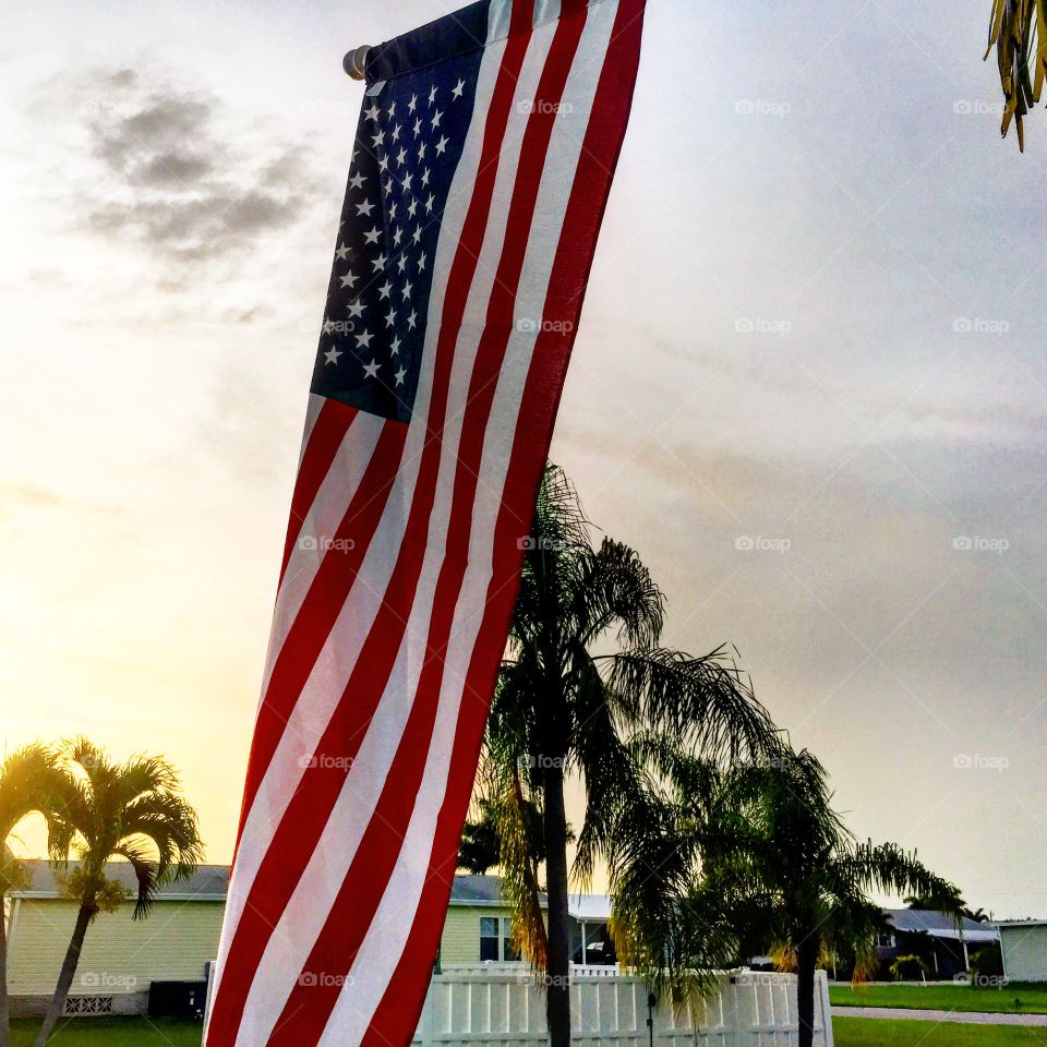 American flag at sunset
