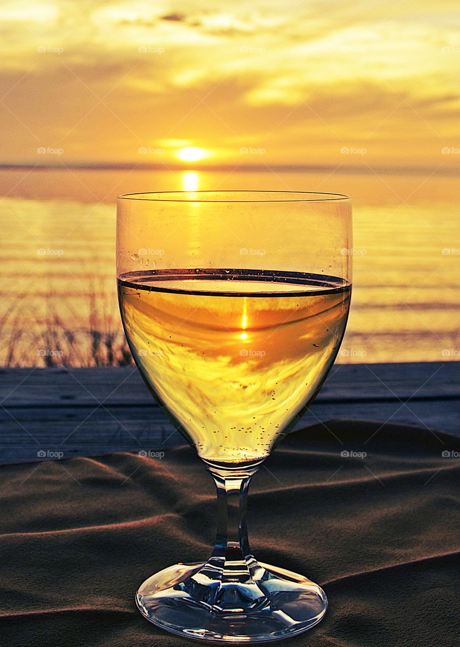 Color Yellow - There is nothing we love more than a nice glass of wine (or two) at the end of a long day, especially on the beach during sunset.