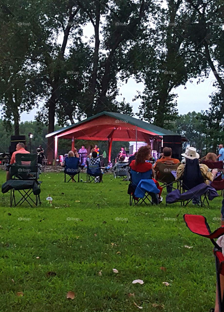 Concert In The Park at Dusk. Lazy Days of Summer