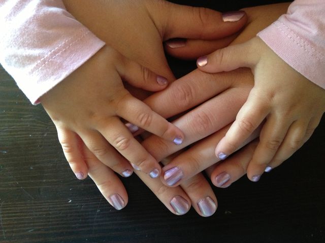 Hand in hand. Mother and daughter