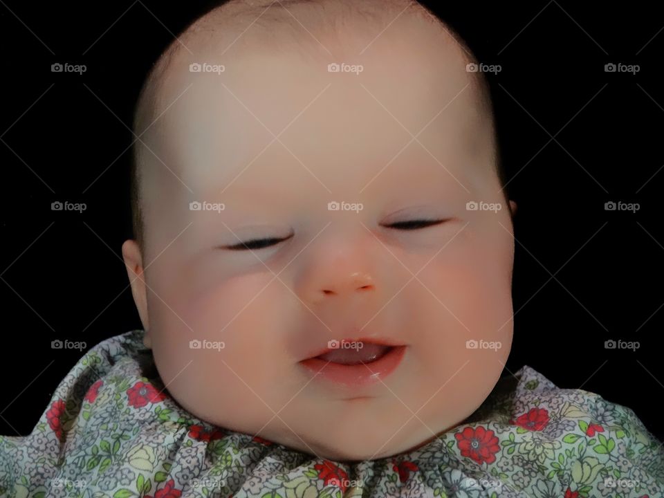 Smiling Newborn Girl

