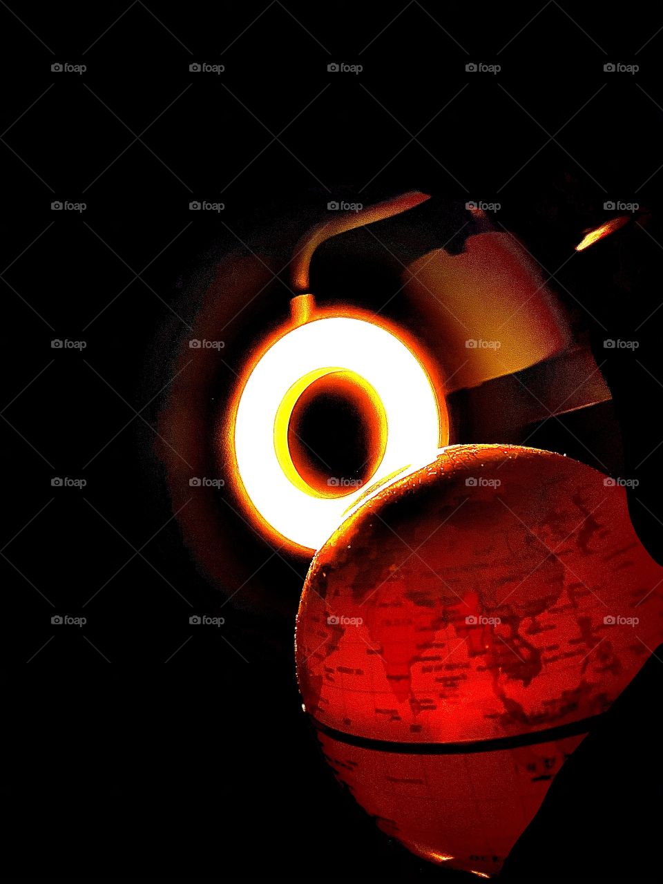 Eclipse seen from space (just a lamp and a globe)