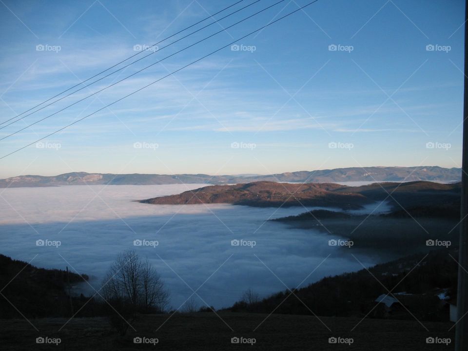 a valley in the mist