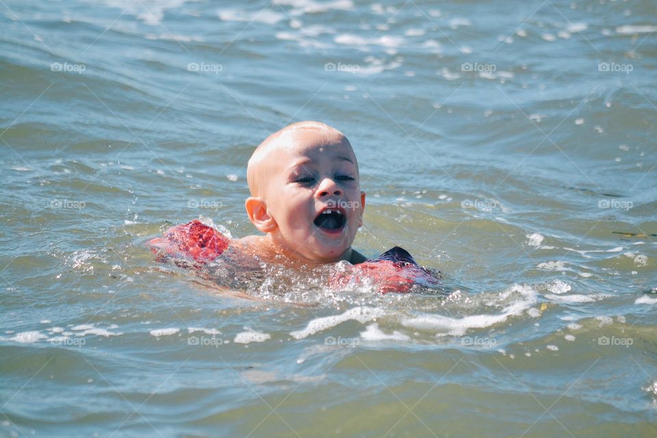 Boy having fun in the ocean