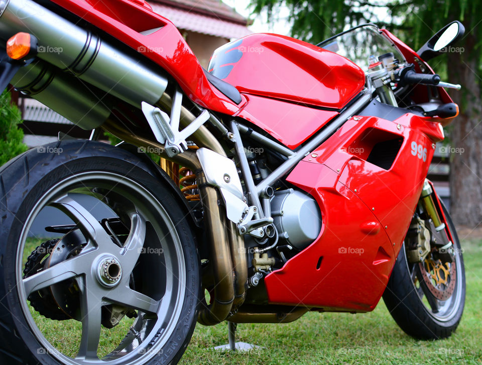 red ducati 996s motorcycle outdoors