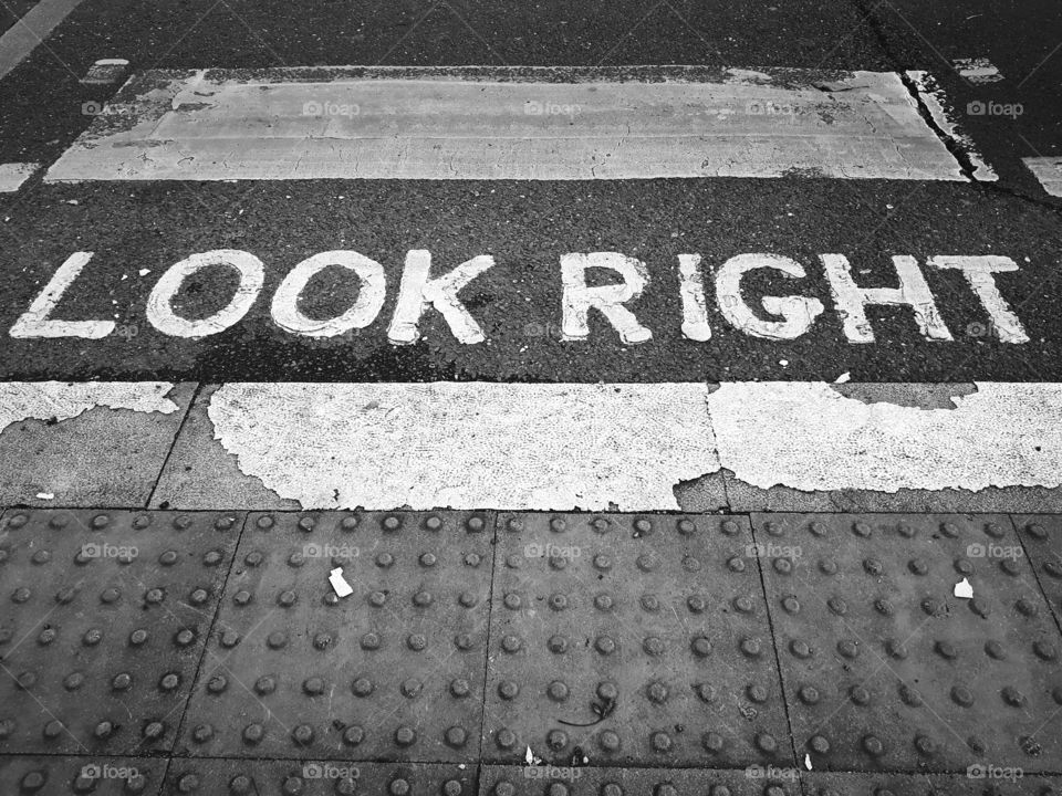look right, zebra crossing in black and white- London, UK