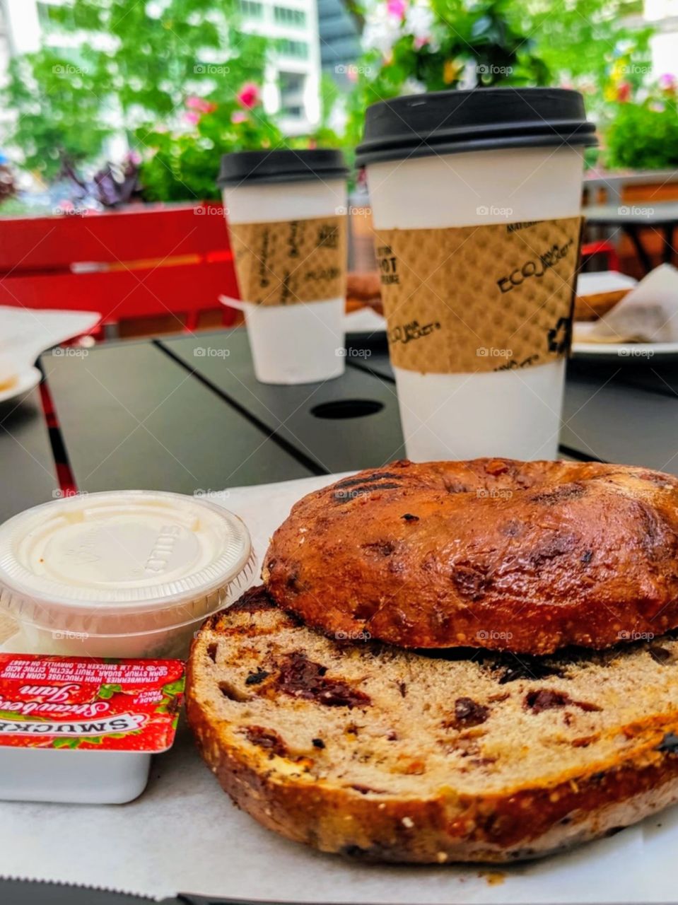 Cinnamon bagel + cream cheese + strawberry jam = delicious breakfast