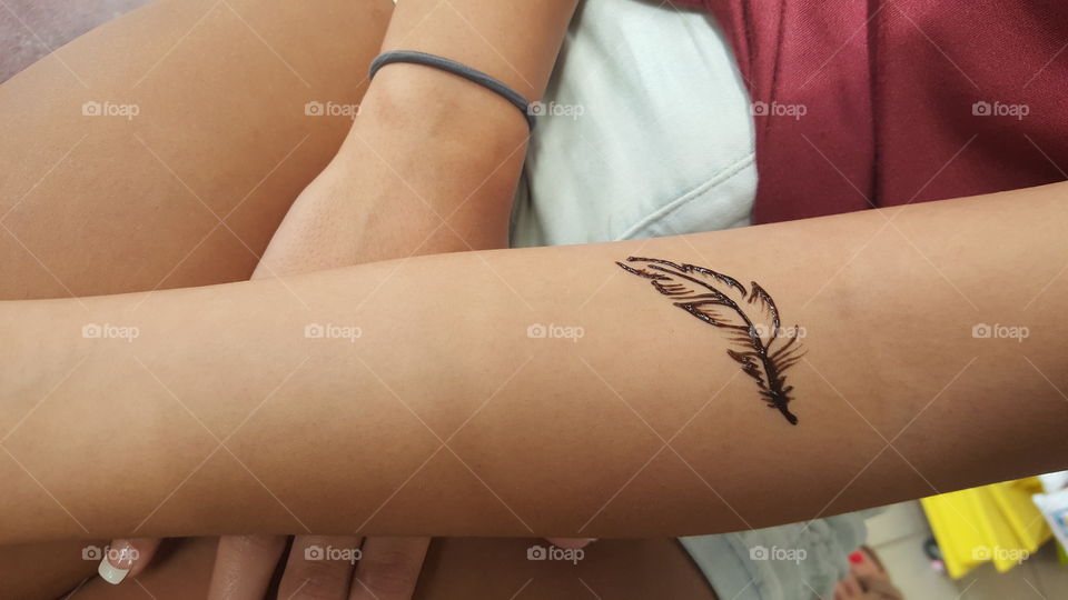 feather henna forearm tattoo
