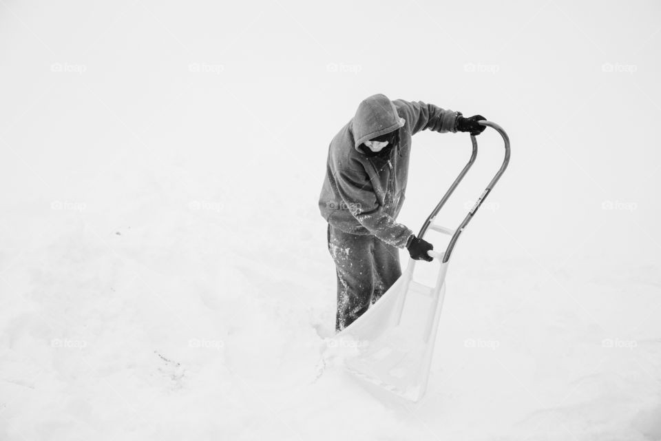 Man shoveling snow