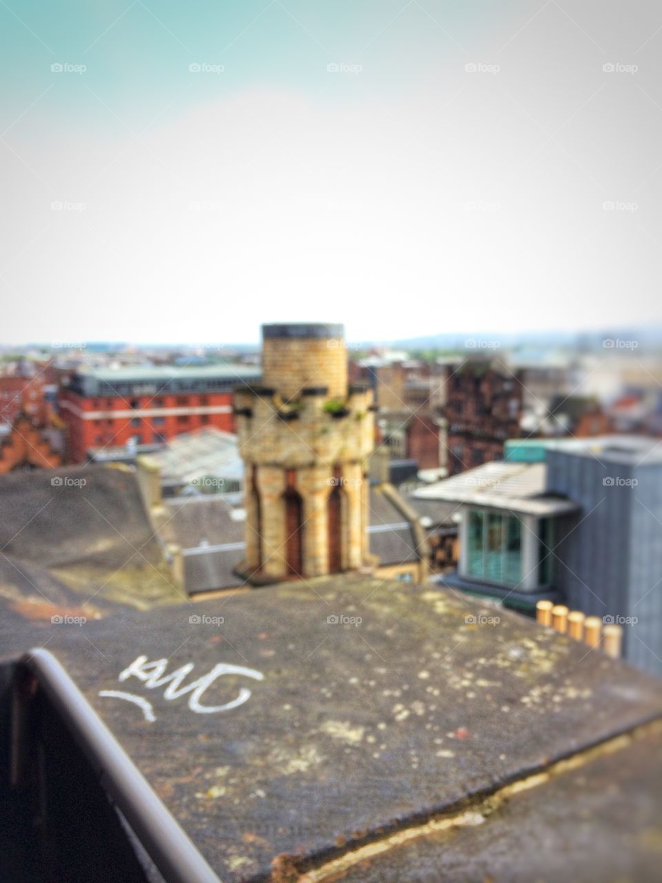 Rooftop photography, city skyline image, graffiti photograph, cloudy day, tourism, travel, Scotland