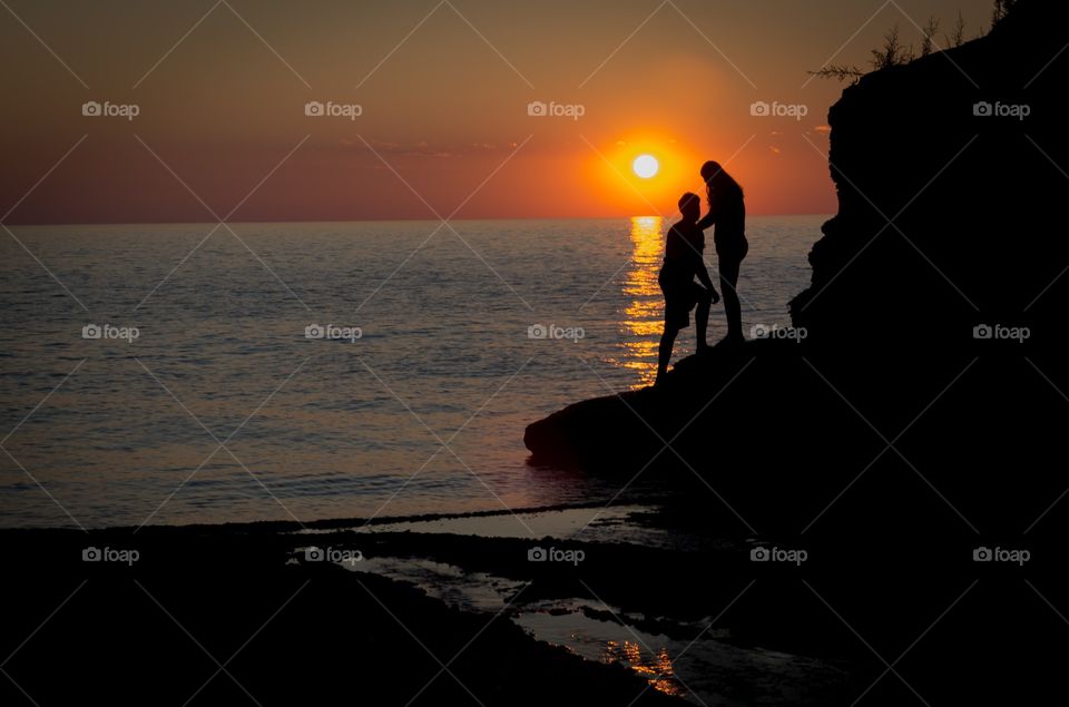 silhouetted at the lake