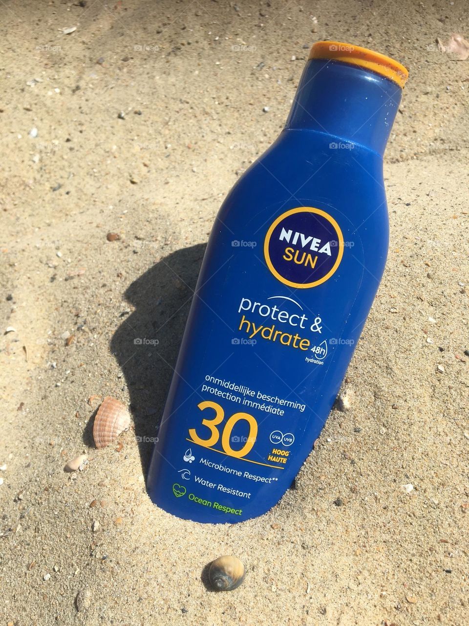 Nivea sunscreen on the sand