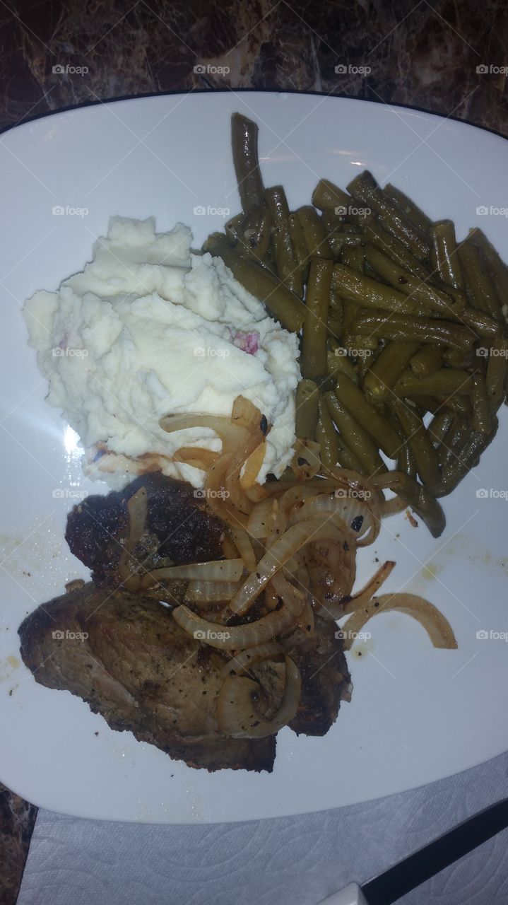 steak with sauteed onions,loaded mashed potatoes and green beans