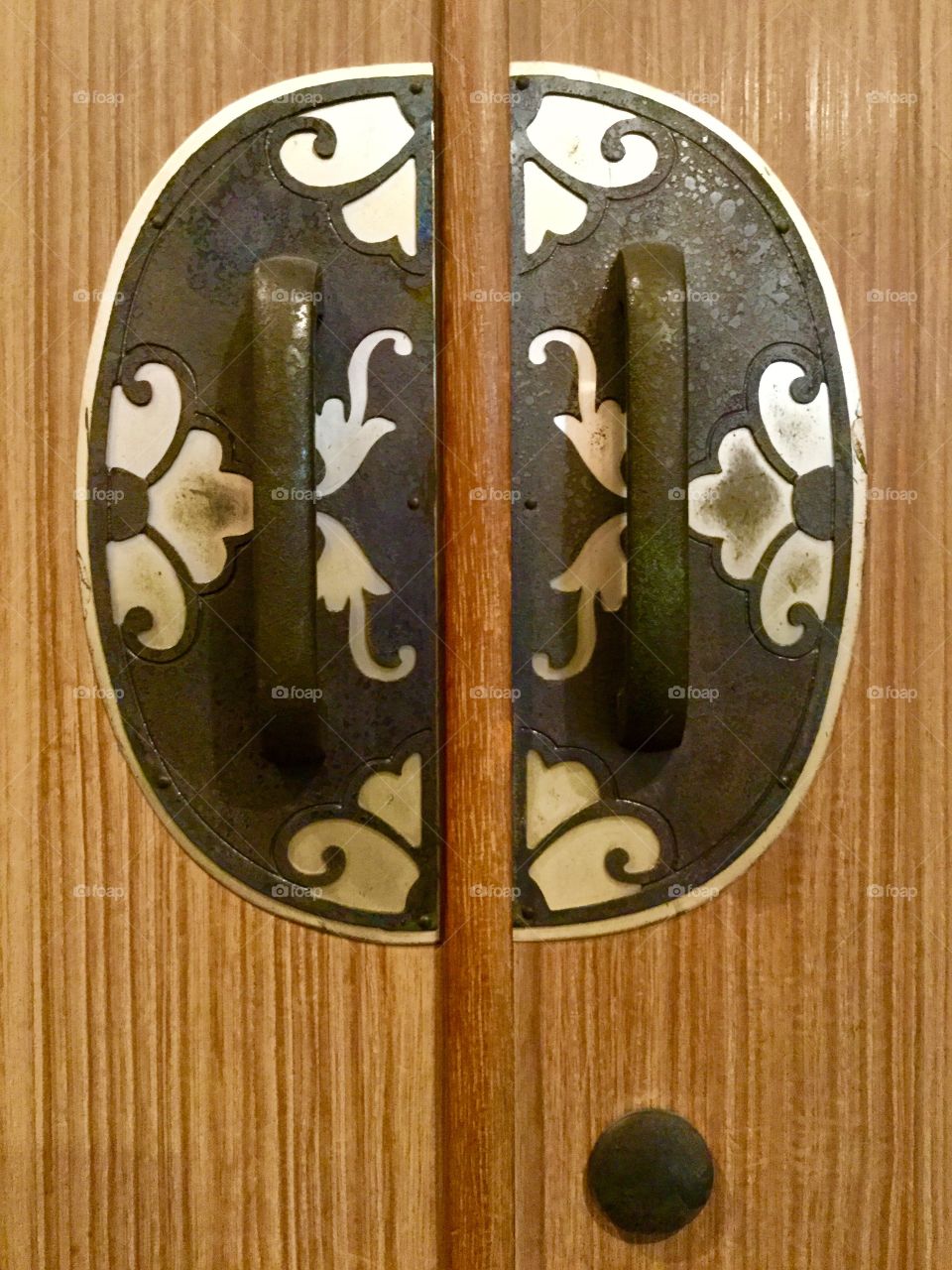 Ornate design on wooden cabinet 
