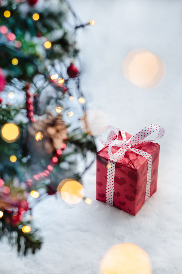 Christmas gifts put under the Christmas tree on the snow outdoor ❄️🎄🎁