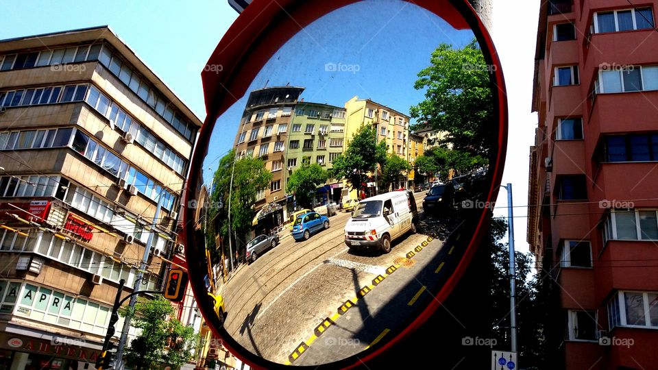 The city streets through the mirror