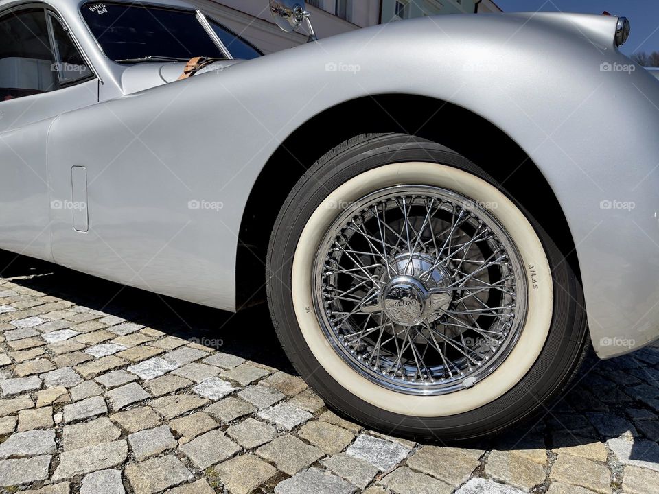 Closeup view of wheel silver retro car 