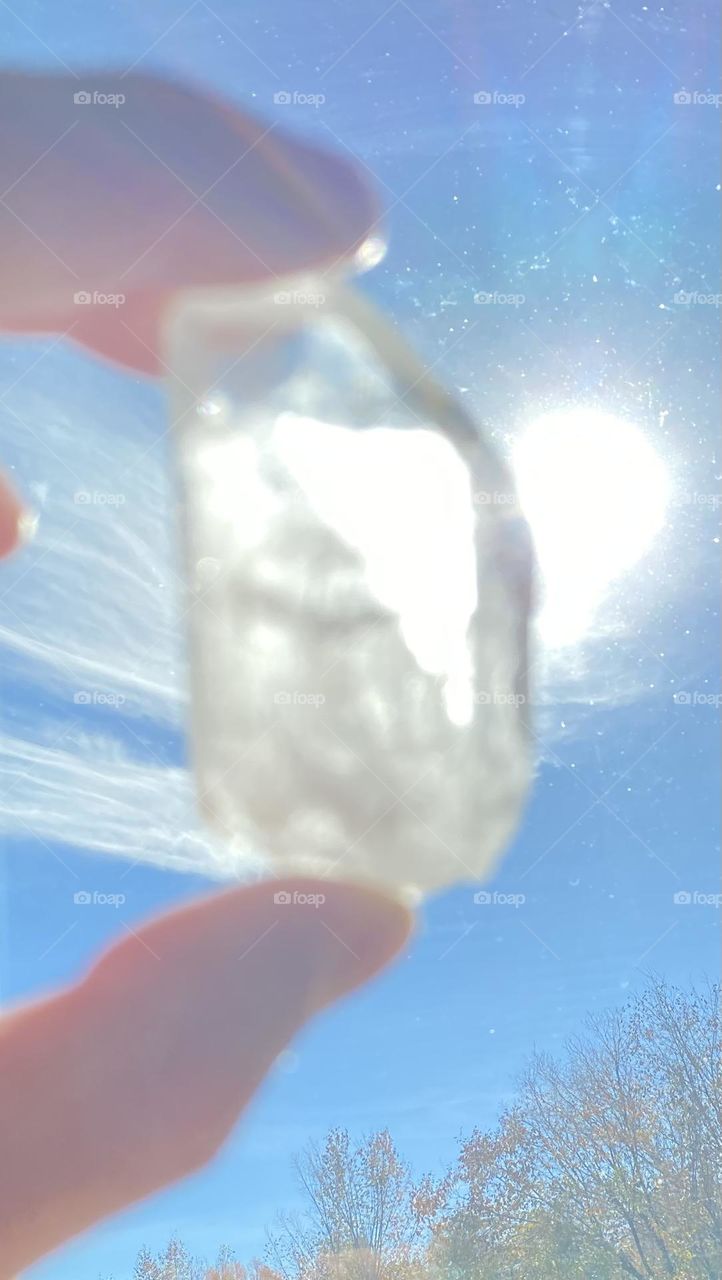 Looking at a crystal with sunlight 