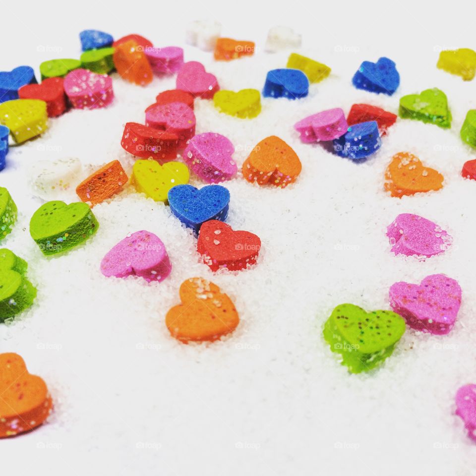 Colorful hearts all around Sweet sugar 