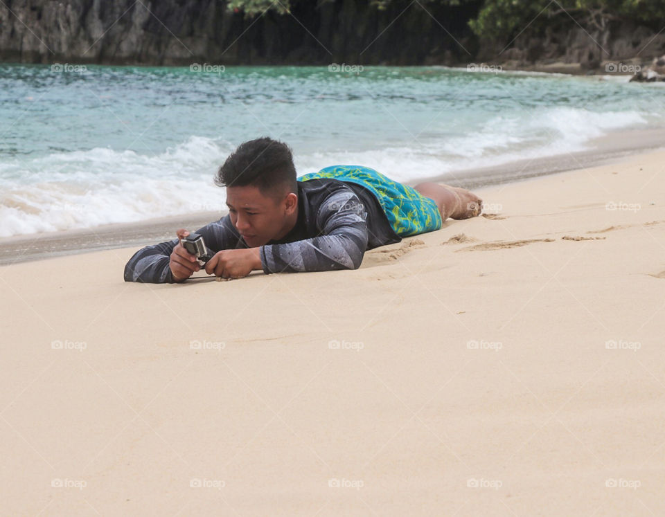 Traveller relaxing on a beach area