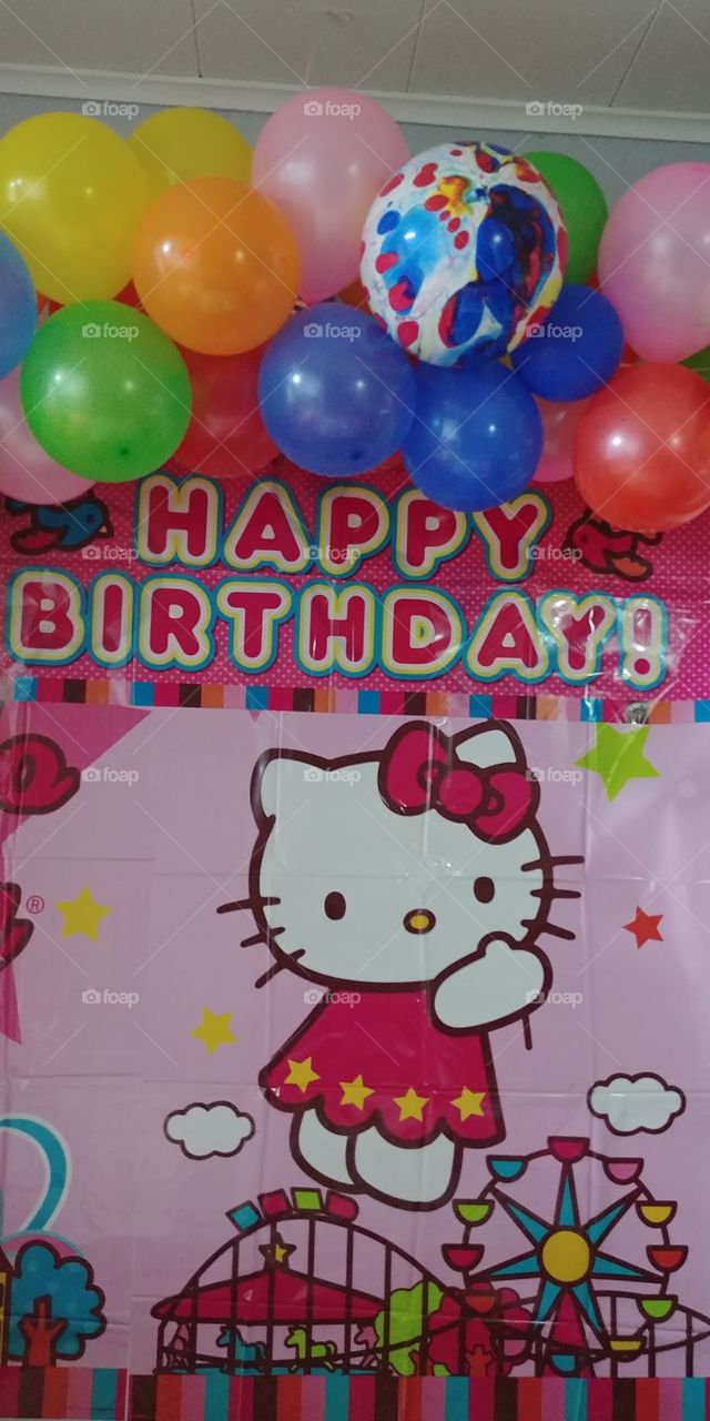 when you make a loved child smile...Happy birthday with Kitty theme festive and pretty.