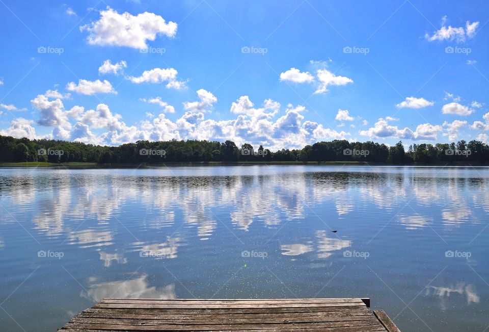 sunny day at the lake in polish countryside