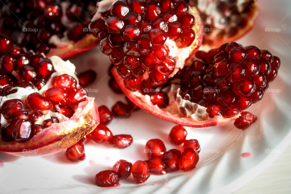 Pomegranate as a snack to a road trip