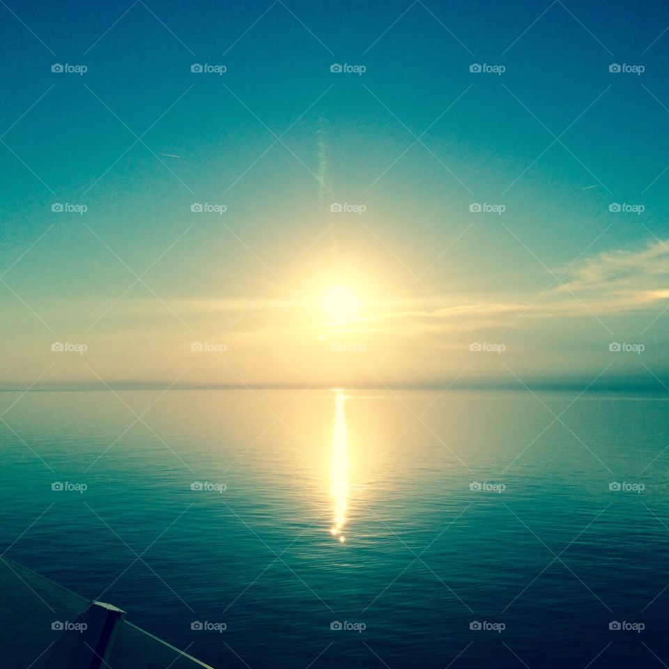 Sunset . Sea sail sun ocean water vacation cruise ship air clouds fresh sunshine 