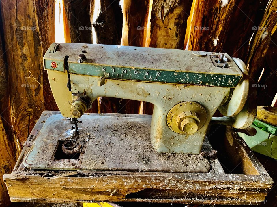 My dads old sewing machine, it’s now old and dusty, non functional but it was beautiful and helpful back then. 