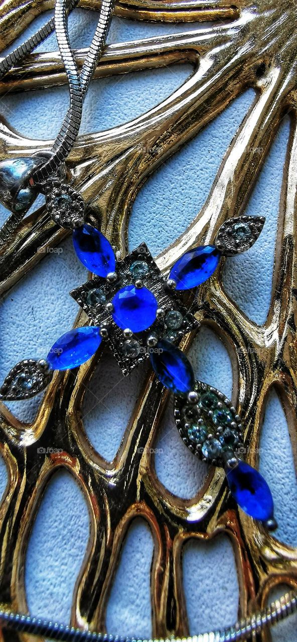 Your best macro shot view focus day part sun sunny gold golden view blue crist faith accesory metal handmade craft