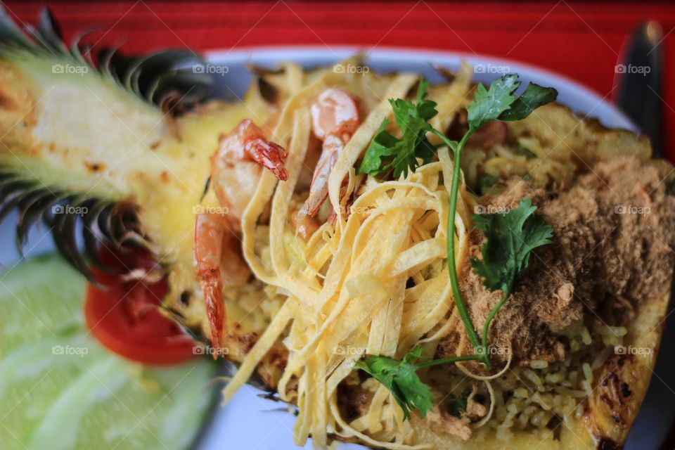 Close-up of spaghetti on pineapple