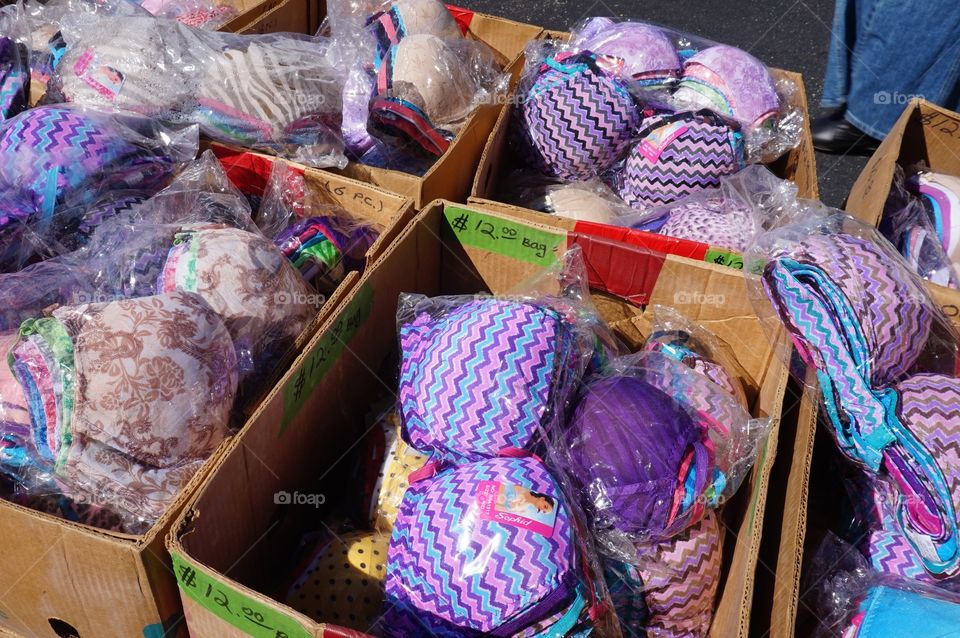 Colorful bras for sale at flea market. 