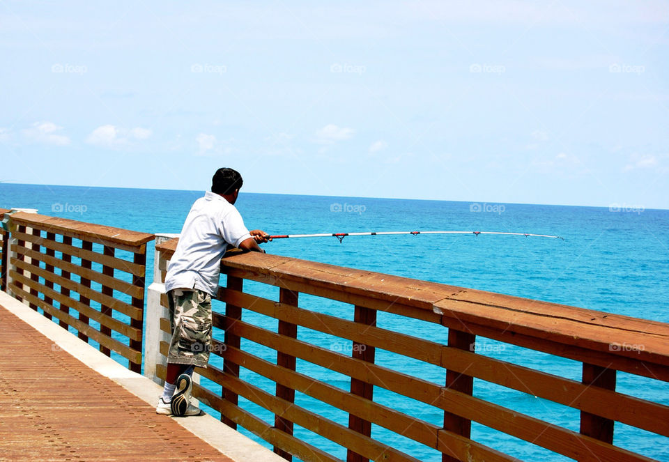 jupiter florida jupiter man fishing by refocusphoto