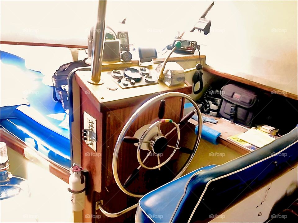 This is the console and the steering wheel for „Salvation“, the „28 foot 1969 Luhrs“ cabin cruiser that we, myself and longtime partner „Timothy Trespas“ call home. It is tied to the shore at „Newtown Creek“ in LIC, Queens. 2018. Hypnotic Productions