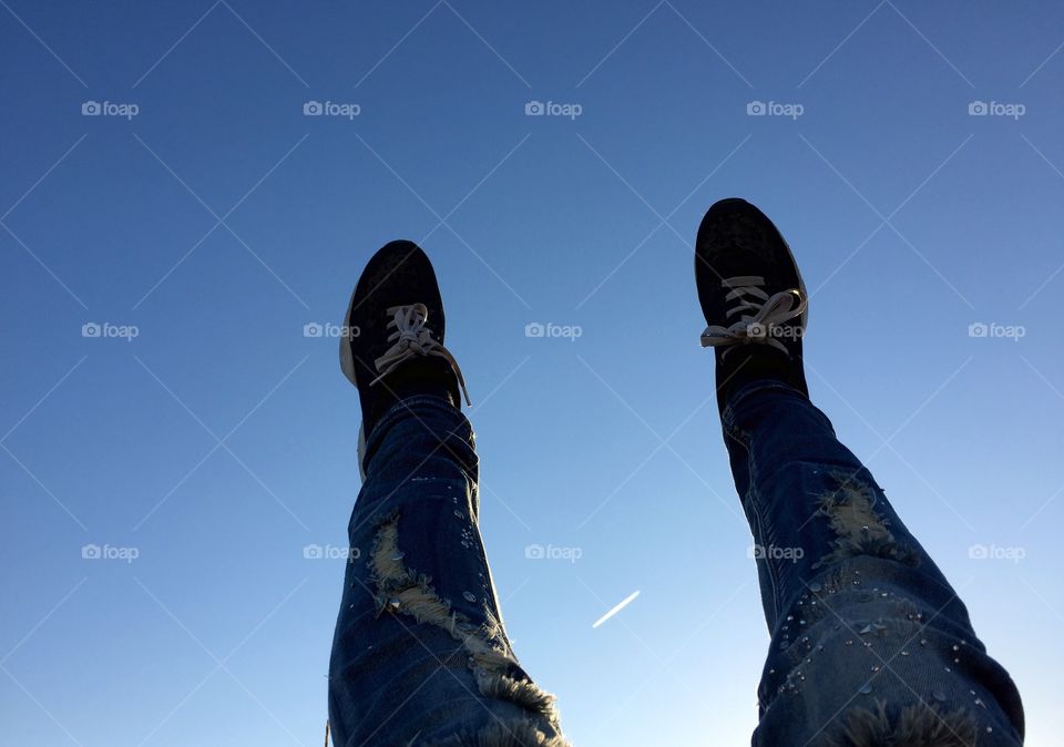 Legs and blue sky