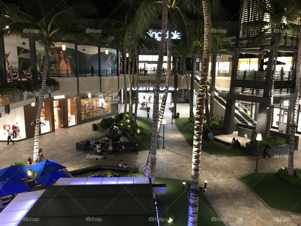 Nice shopping mall at Honolulu Hawaii, trees in the mall 