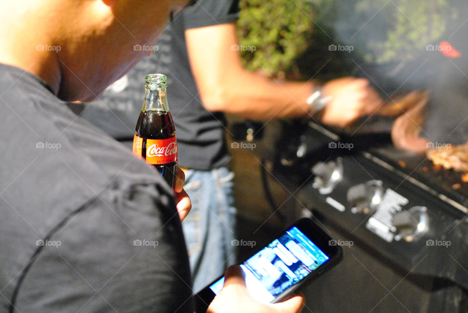 Weekend grilling bbq and Coca-Cola is the best when shared with friends