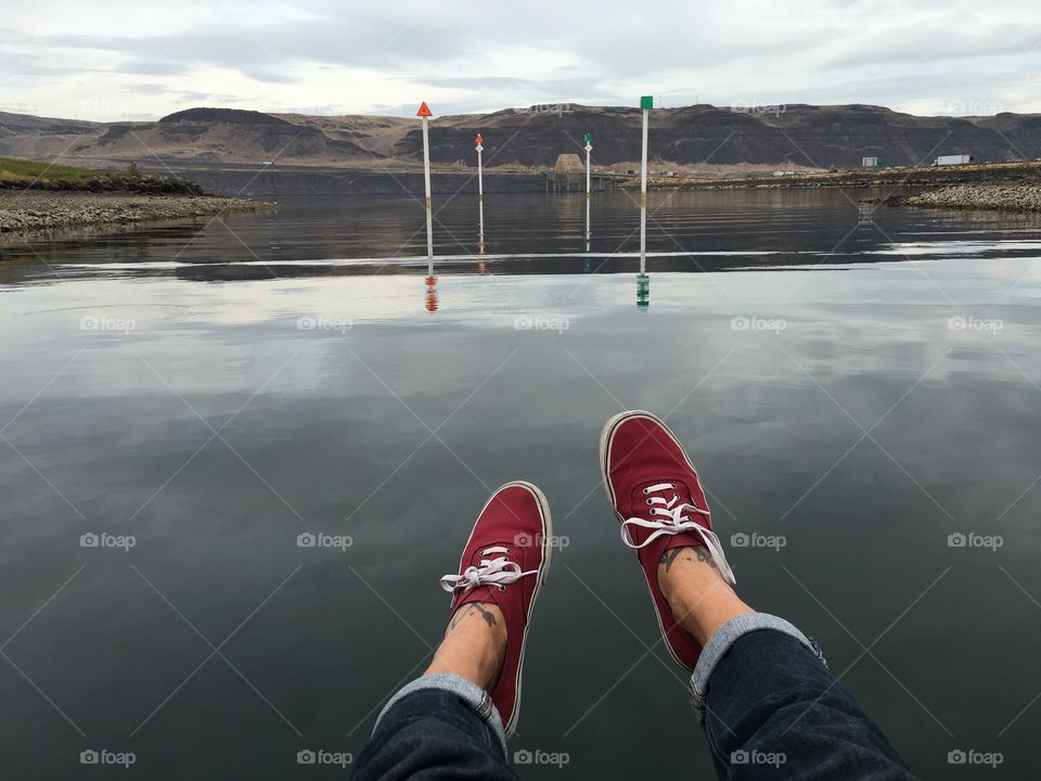 My feet over some water in Washington.