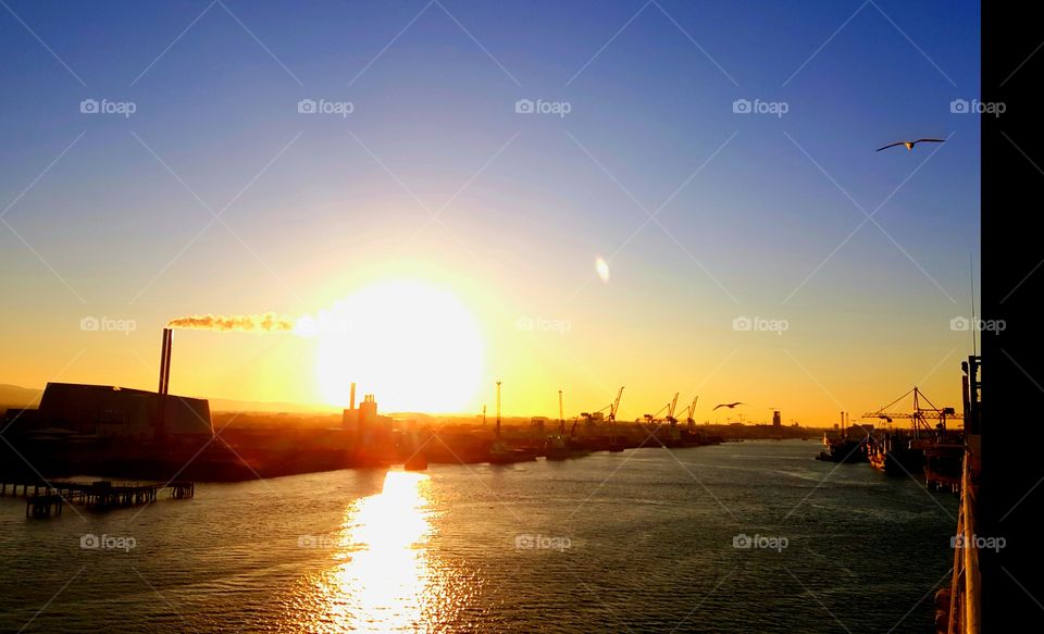 sunset on Dublin Harbour as Irish ferries prepares to Dock.