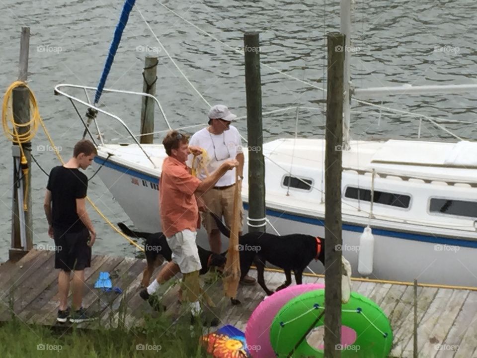 Man getting the boat ready