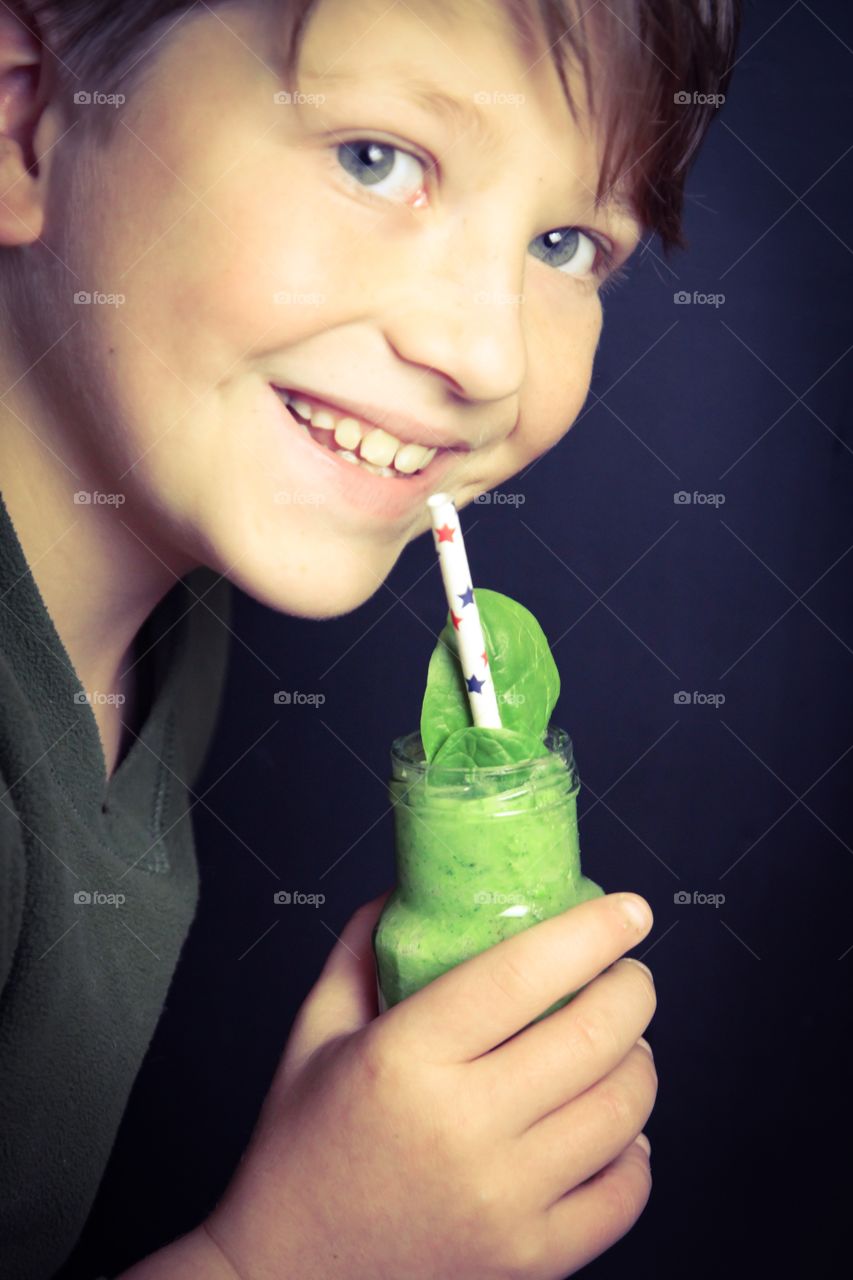 Enjoying a green smoothie